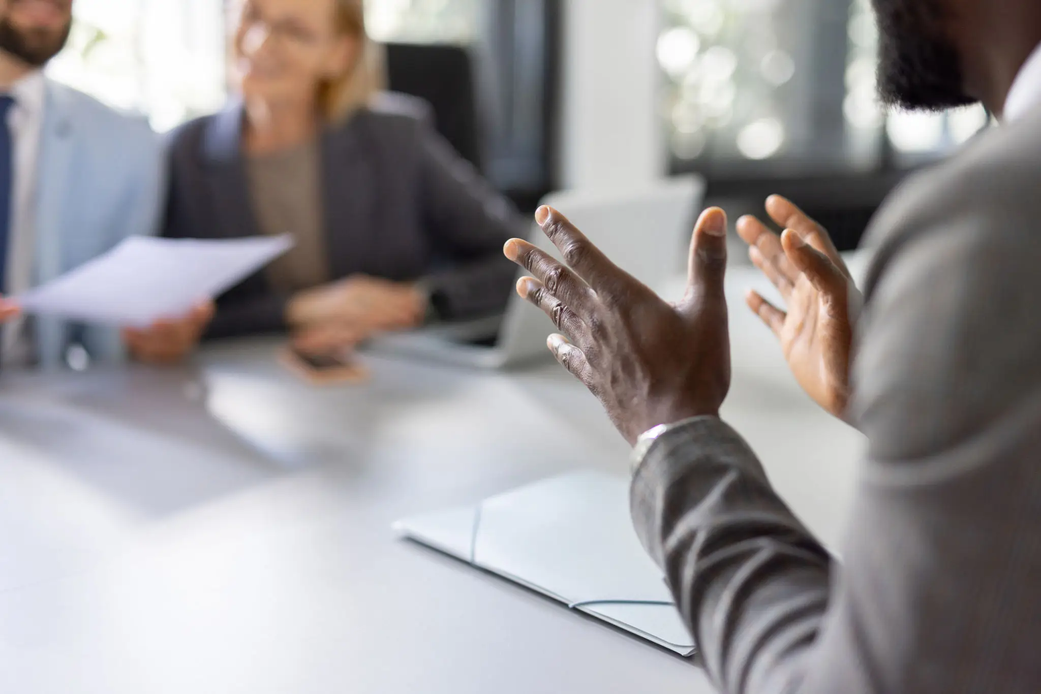 Wealth management leaders reviewing client strategy, portfolio risk, and compliance controls